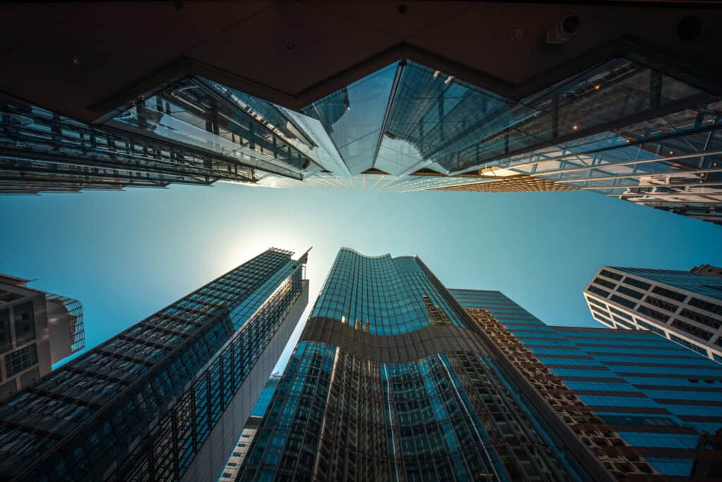 Modern skyscrapers in a financial district skyline.